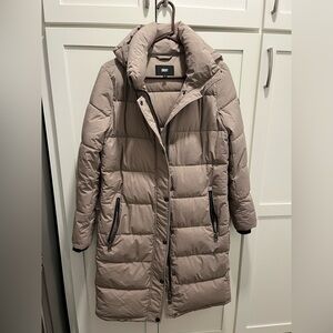 DKNY- long puffer coat. Very warm, thumb cuffs, deep pockets inside and outside